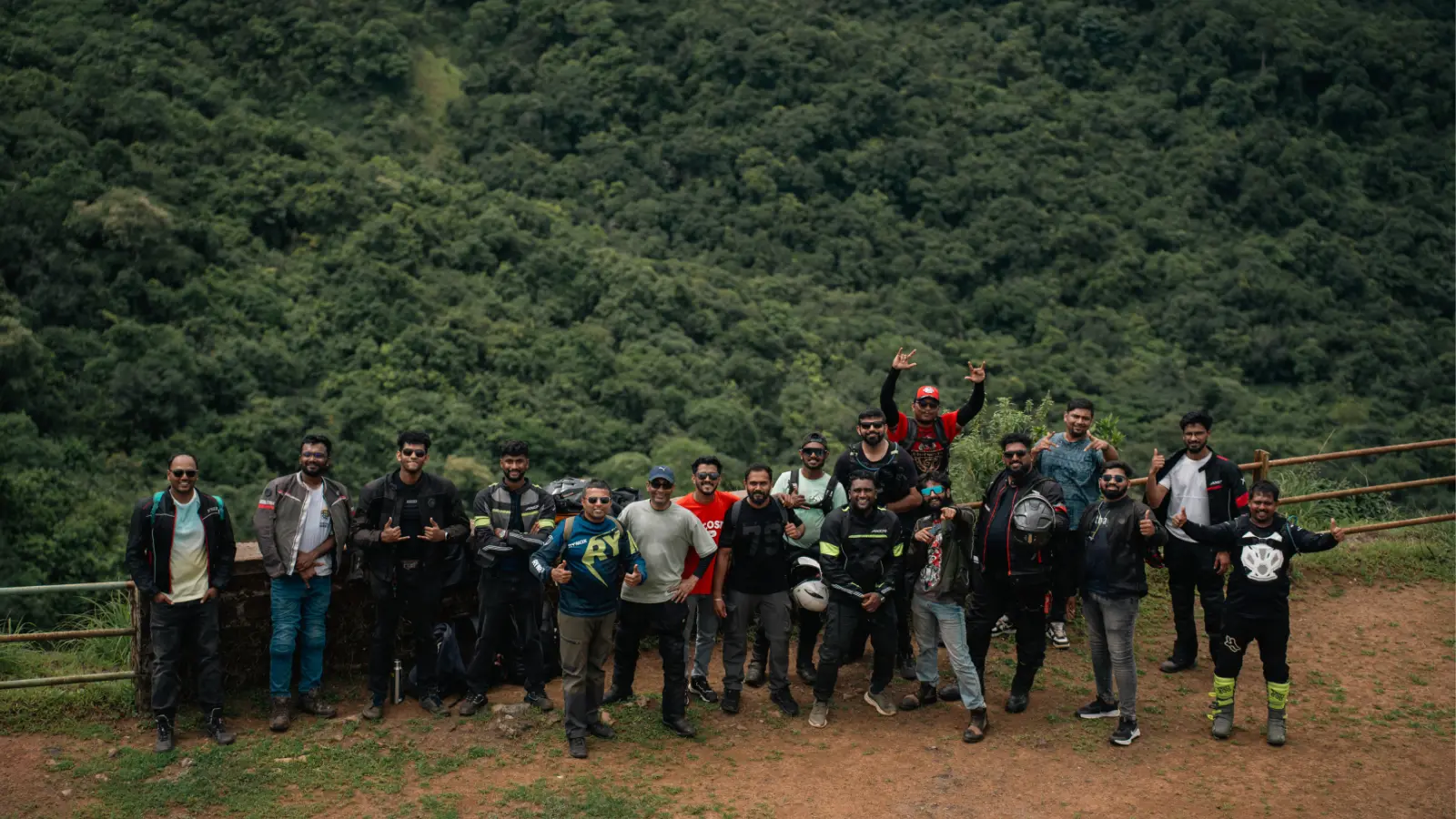 Adventure riders gathered at a scenic Western Ghats viewpoint, sharing a well earned break after tackling the forest trails together.