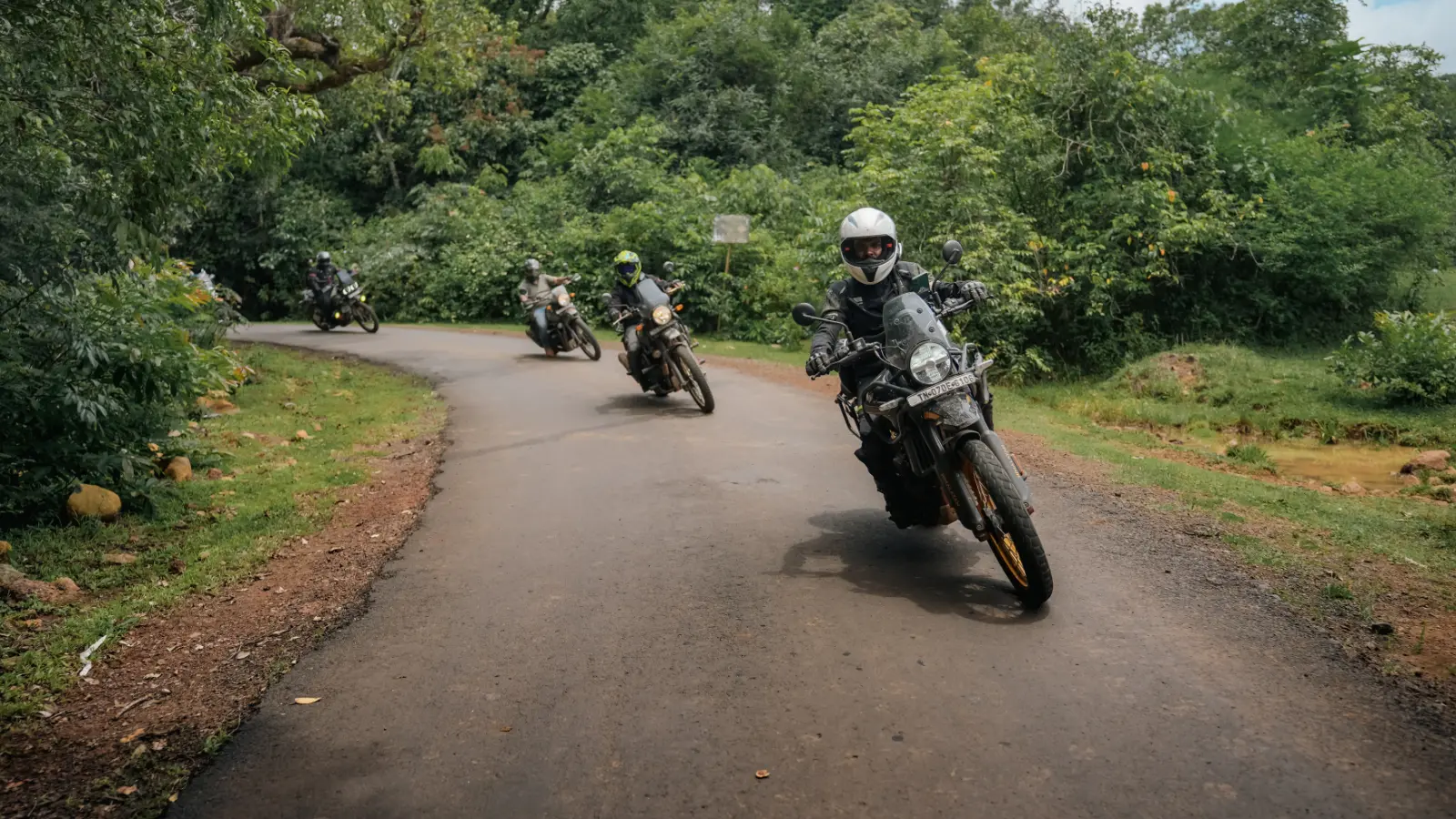 Riders gather before setting off on a group ride through the forests of Pargad.