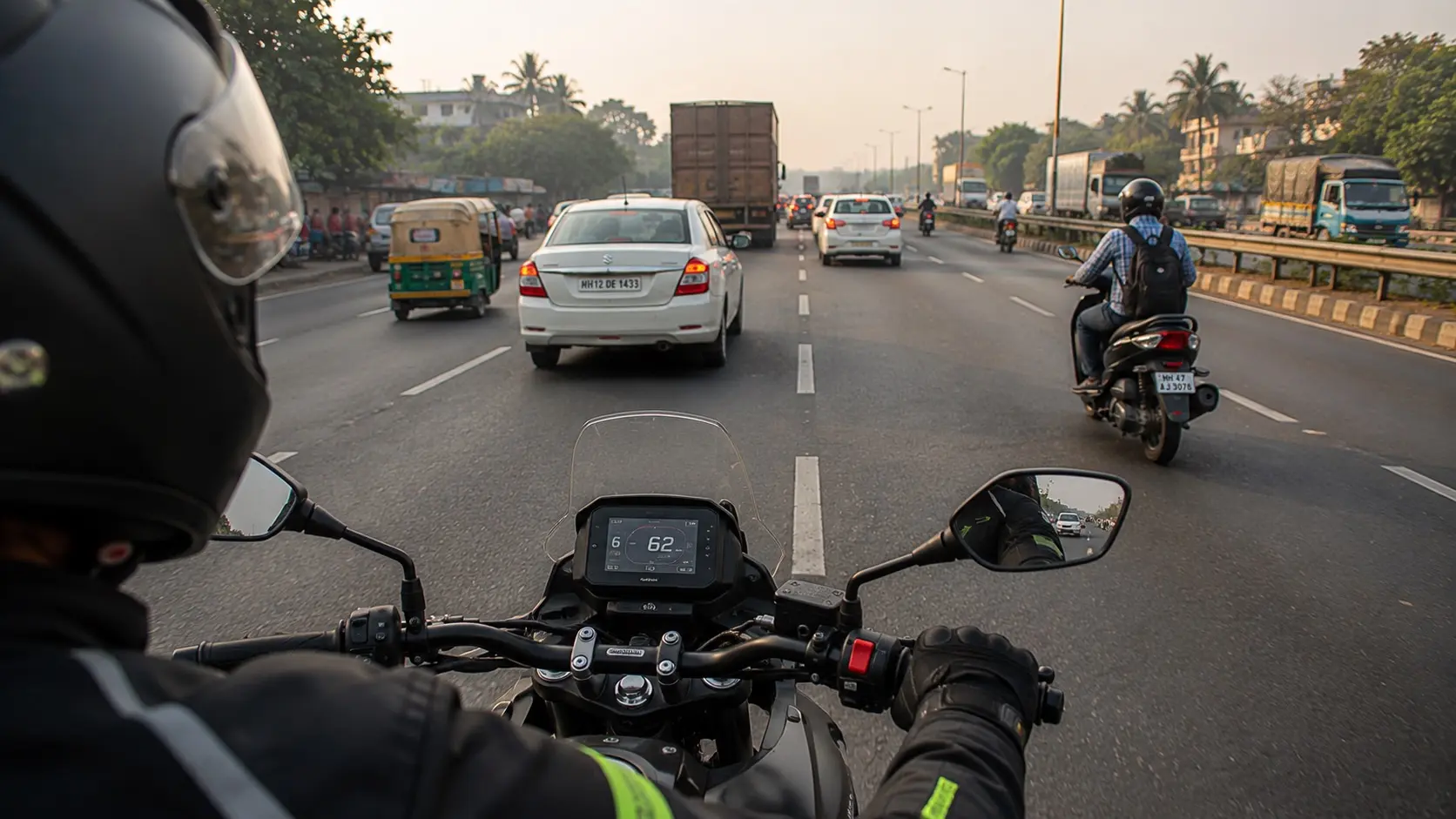 Over the shoulder view from a motorcyclist showing mirrors, traffic and the road ahead