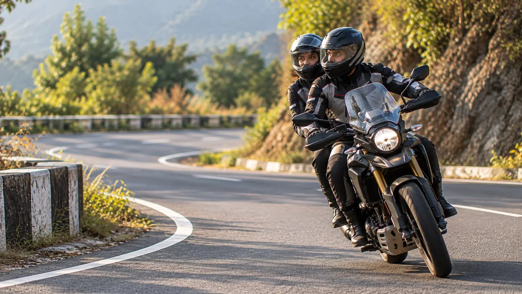 Rider and pillion moving naturally together through a gentle bend