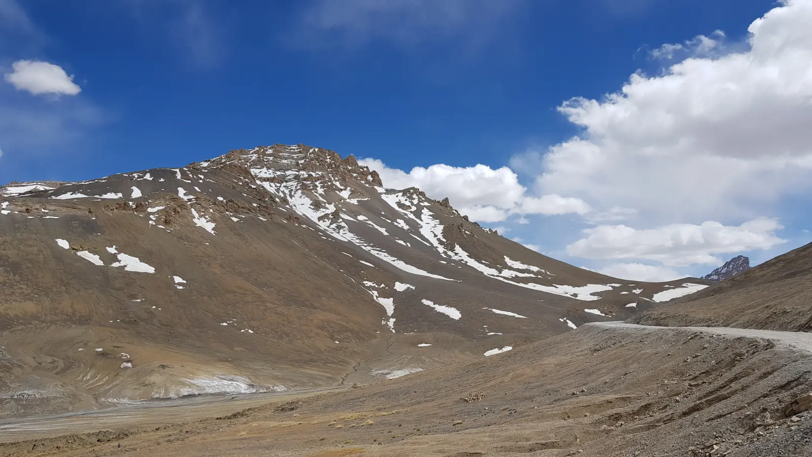 Mountain scenery beneath dramatic skies