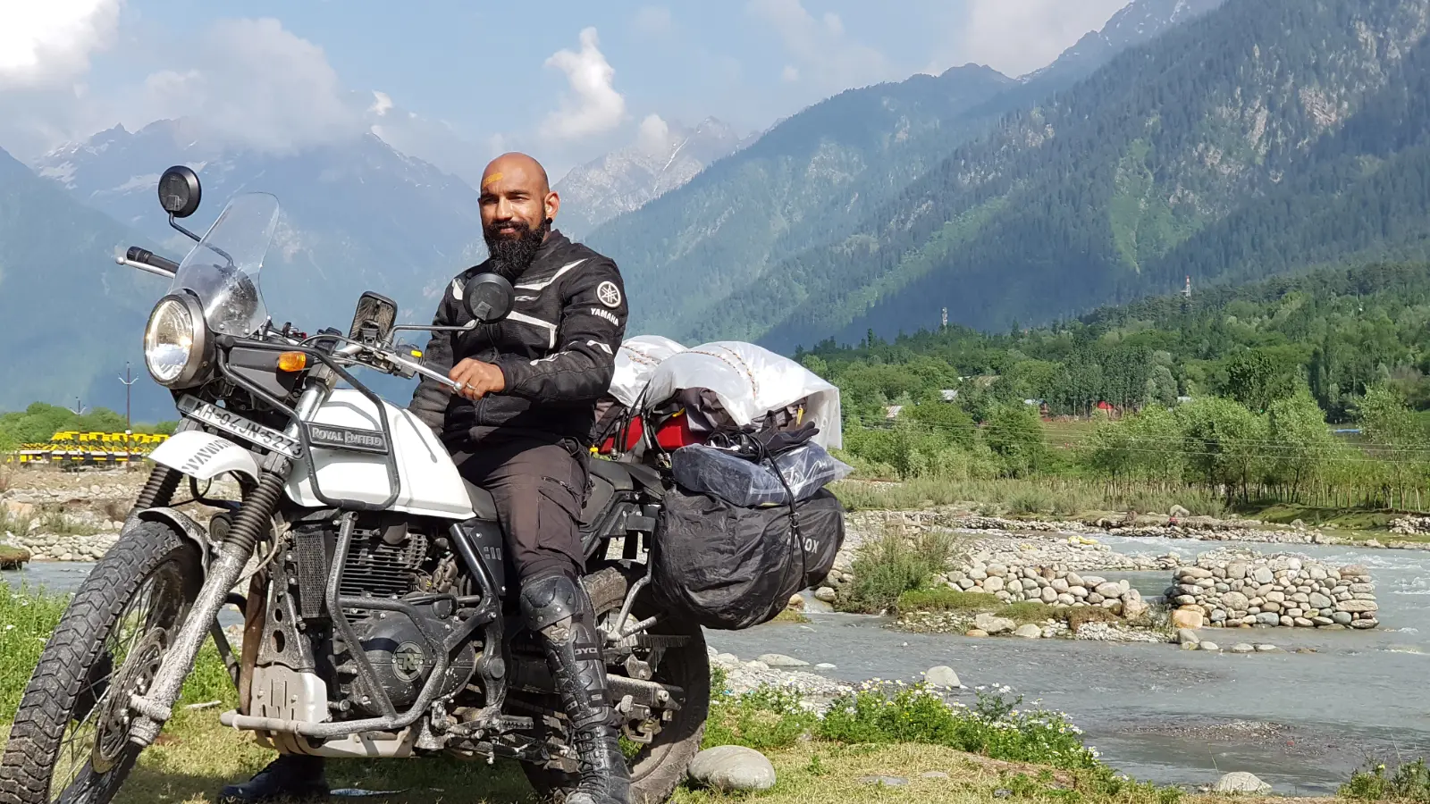 Royal Enfield Himalayan rider travelling through the Himachal Pradesh landscape