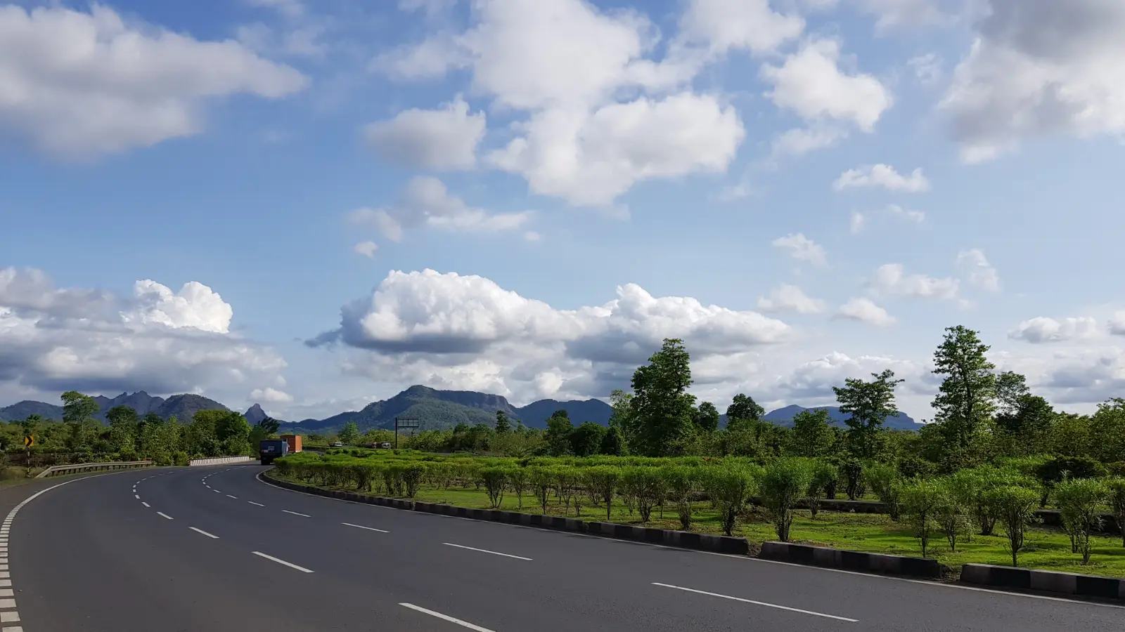 Mountain road winding through Himachal terrain
