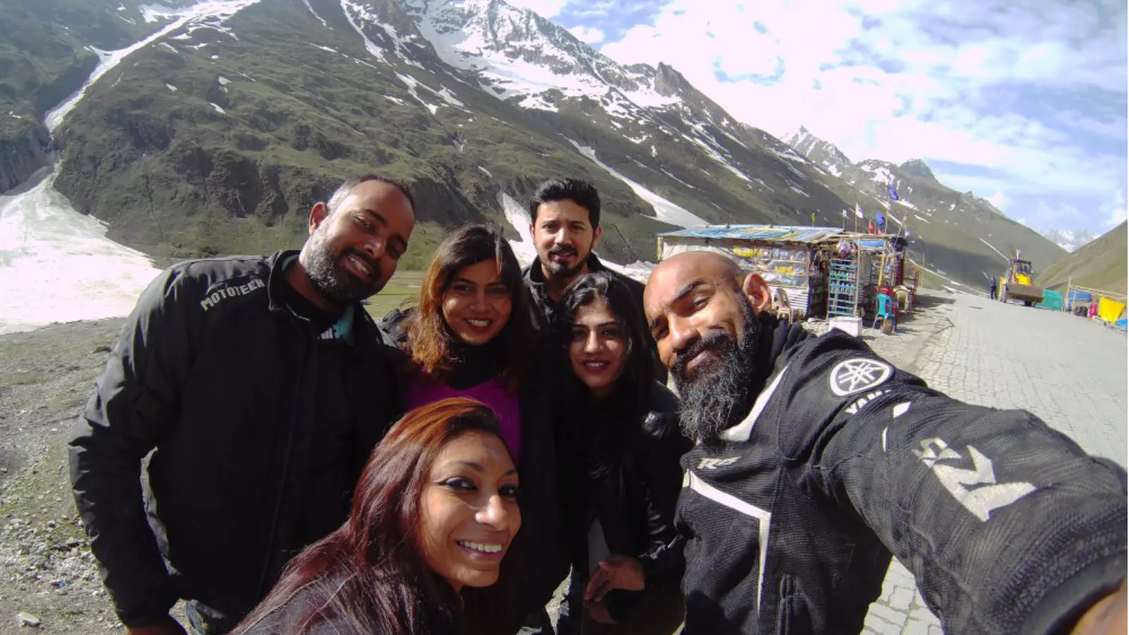 Royal Enfield Himalayan riders overlooking Pangong Lake during a Ladakh expedition