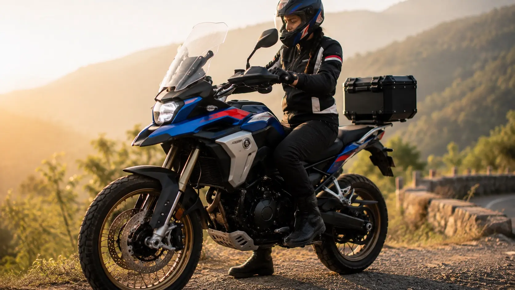 Riding boot planted securely on an adventure motorcycle foot peg
