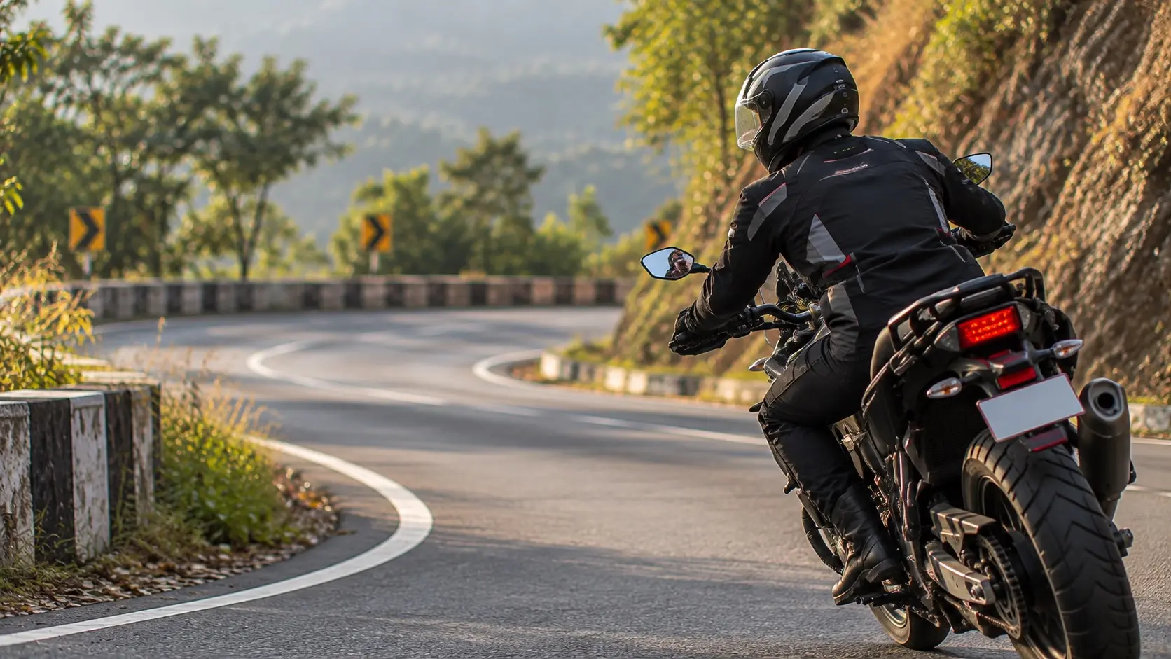 Motorcyclist exiting one bend while already looking through the next